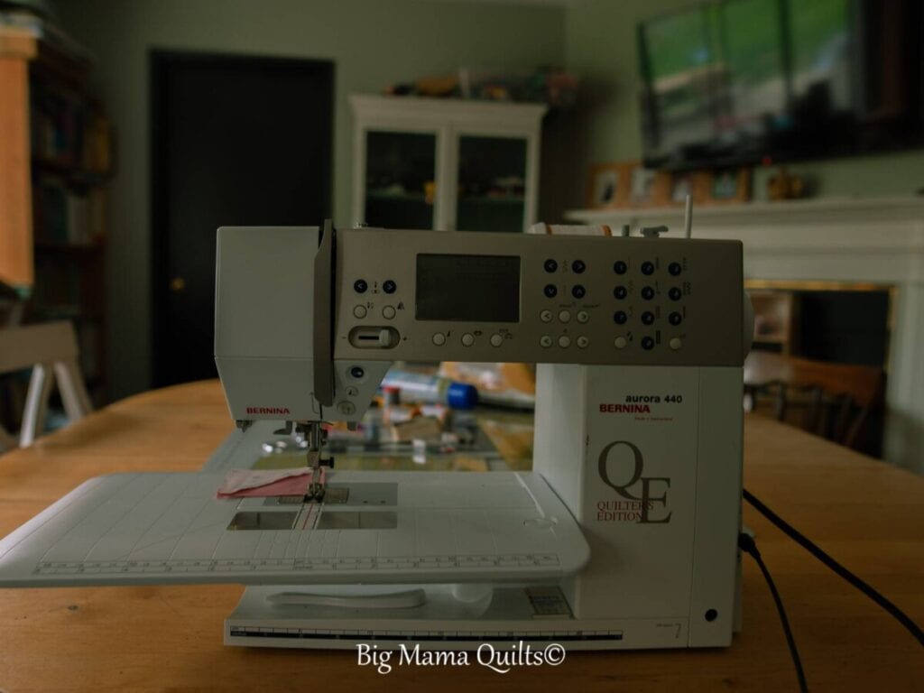 Bernina sewing machine on a table in a playroom.  Learn to quilt