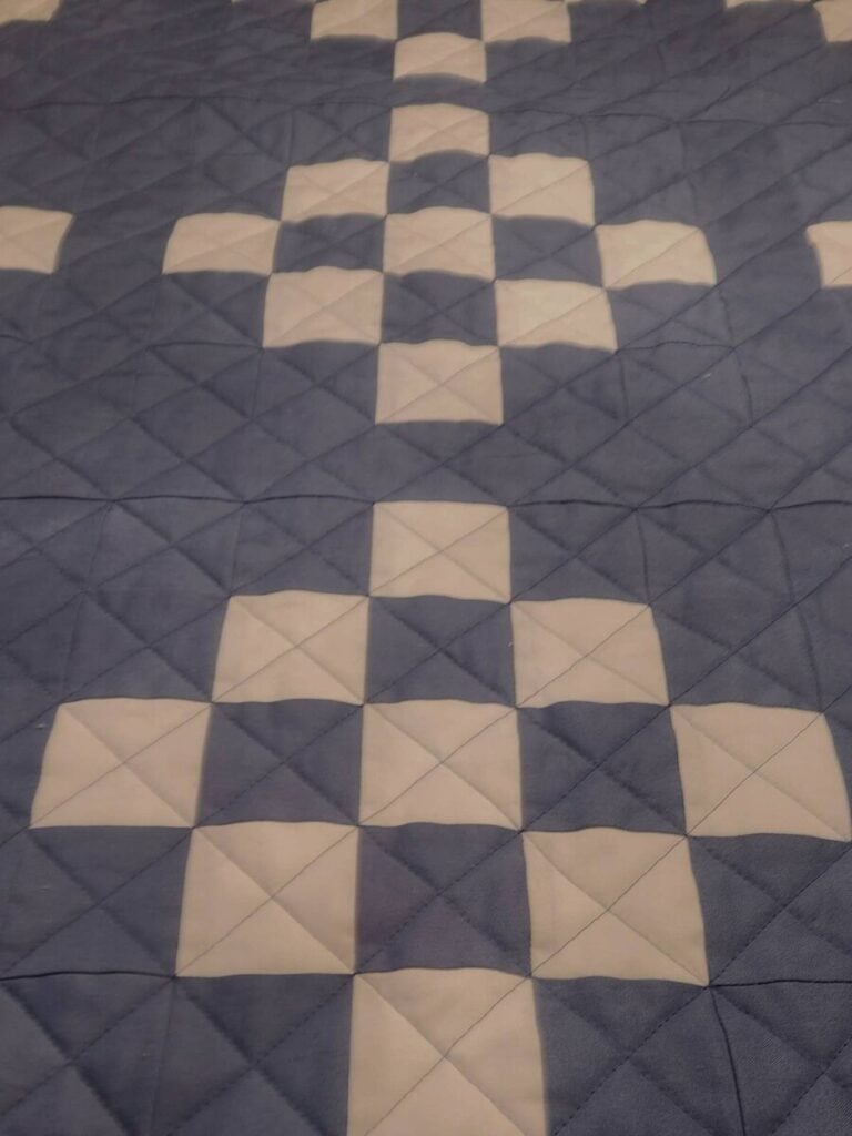 Cross hatch quilting on quilt