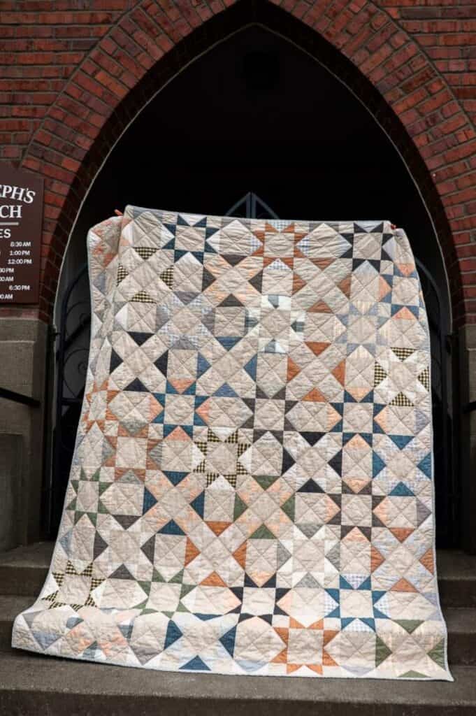 Benedict quilt a scrappy flying geese twin size quilt in boy neutral fabrics